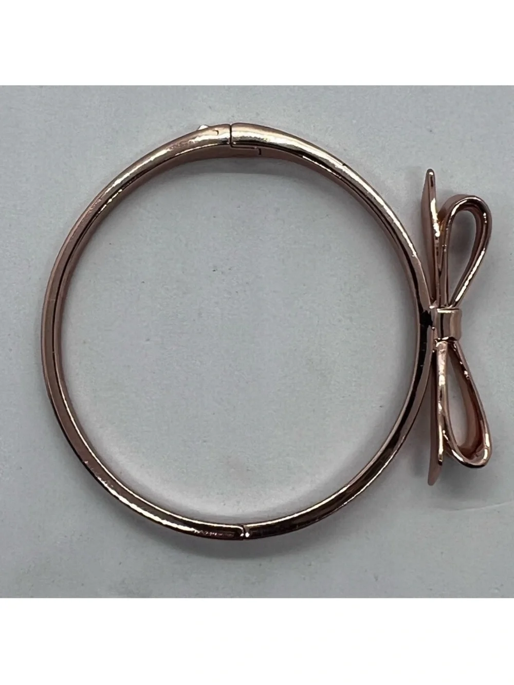 kate spade Rose Gold Bow Bangle Bracelet with dust bag.